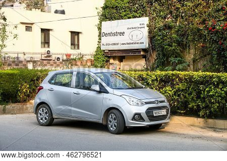 Gurgaon, India - March 3, 2022: Grey Minicar Hyundai I10 In A City Street.