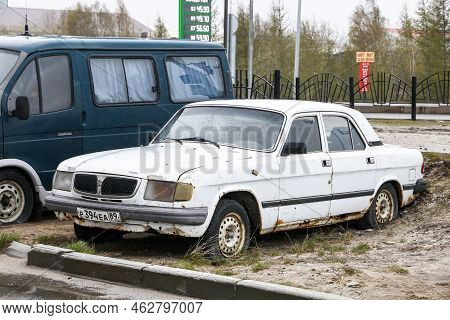 Novyy Urengoy, Russia - June 4, 2022: Abandoned Luxury Car Gaz-3110 Volga In A City Street.