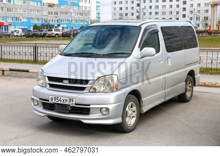 Novyy Urengoy, Russia - June 05, 2022: Light Passenger Van Toyota Hiace In A City Street.