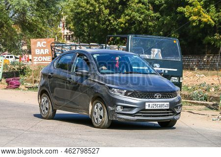 Sawai Madhopur, India - March 1, 2022: Grey Minicar Tata Tigor In The City Street.