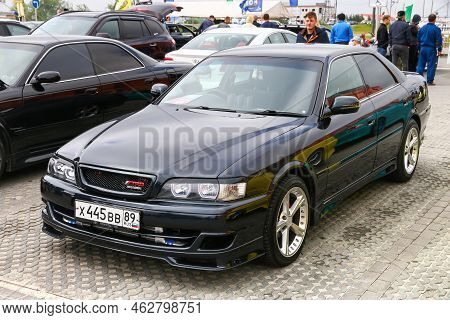 Novyy Urengoy, Russia - July 15, 2017: Black Japanese Sedan Toyota Chaser (x100) Presented At The Dv