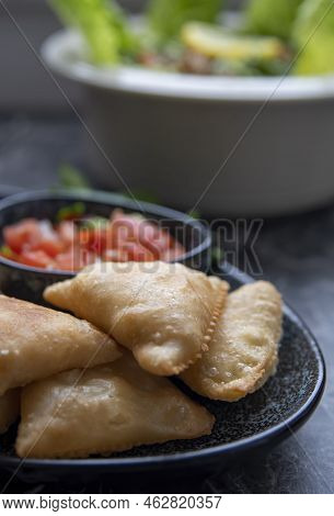 Samosa Is A Fried Or Baked Pastry With A Savory Filling, Such As Spiced Potatoes, Onions, Peas, Chee