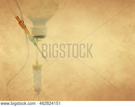 Intravenous Medical Perfusion System On Old Paper Background And Copy Space