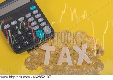 Tax Btc Cryptocurrency With Tax Wording On Bitcoin And Caculator On Stock Graph Yellow Background