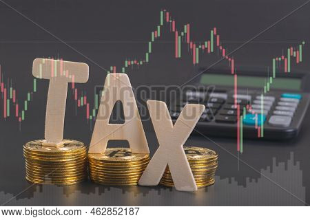 Tax Btc Cryptocurrency With Tax Wording On Bitcoin And Caculator On Stock Graph Yellow Background