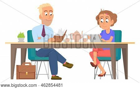Couple Drink Coffee At Table. Home Breakfast. Man Read Book. Woman Look At Tablet