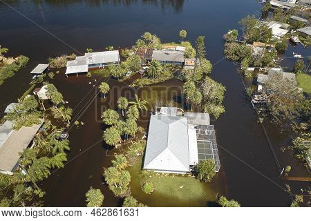 Hurricane Ian Flooded Houses In Florida Residential Area. Natural Disaster And Its Consequences
