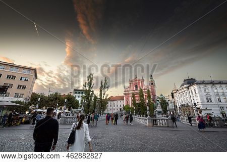Ljubljana, Slovenia - June 14, 2021: Tromostovje Bridge (triple Bridge) In Front Of The Presernov Tr