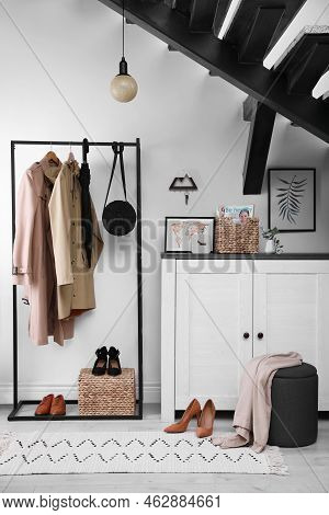 Modern Hallway Interior With Stylish Furniture And Key Holder