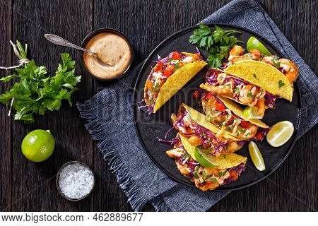 Bang Bang Shrimp Tacos With Purple Coleslaw, Tomatoes, Parsley, Lime And Mayonnaise Hot Chili Sauce 