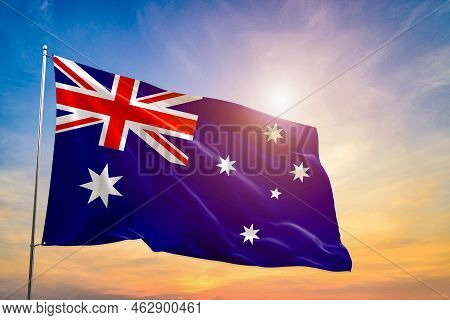 Detailed Close Up Of The National Flag Of Australia Waving In The Wind On A Clear Day. Democracy And