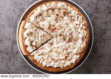 Dutch And Belgian Rice Cake Tart With Whipped Cream And Chocolate Chips Close-up In A Plate On The T