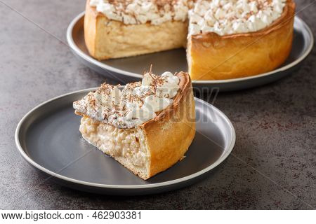 Rijstevlaai A Rice Pie, Something That Appears In Dutch And German Cuisines Close-up In A Plate On T