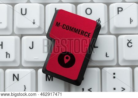 Sign Displaying M Commerce. Internet Concept Commercial Transactions Conducted Electronically By Mob