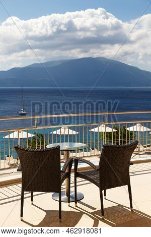 Summer Balcony With Coffee Table, Cozy Chairs And Splendid Sea View. Morning At Greek Islands. Beaut