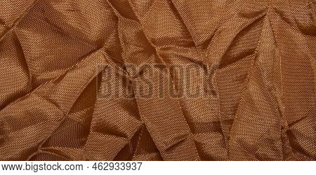 Brown Bolognese Crumpled Fabric.the Background Of The Bolognese Fabric.brown Twill Fabric.the Fabric
