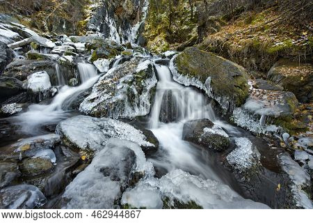 Russia. The South Of Western Siberia, The Altai Mountains. Stormy Streams Of Water Ice On The Karasu
