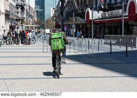 Brussels City Center, Brussels Capital Region - Belgium - 05 01 2021 Uber Eats Delivery Boy Driving 