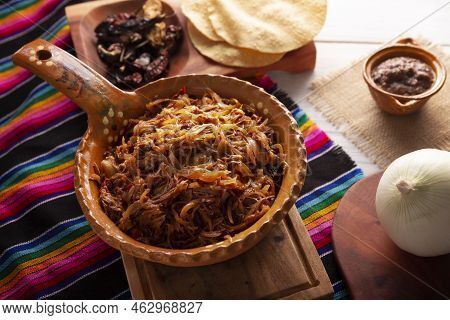 Tinga De Res. Typical Mexican Dish Prepared Mainly With Shredded Beef, Onion And Dried Chilies. It I