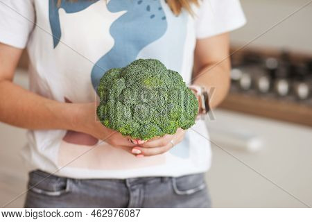 Womam Hands. Food Background. Food Concept.picture Of Kitchen Table With Fresh Green Brokkoli . Vege