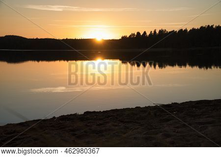 Sunset With Reflection On A Swedish Lake In Smalland. Romantic Evening Mood. Landscape Shot From Sca