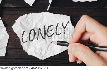 Lonely - An Inscription On A Piece Of Paper. Feeling Of Loneliness. Autophobia - Fear Of Being Alone