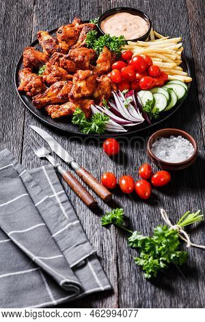 Spicy Roast Chicken Wings With French Fries, Tomatoes, Cucumber, Red Onion And Thousand Islands Dip 