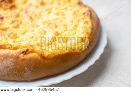 Shanga: Traditional Russian Pastries With Potatoes And Eggs. Khachapuri With Cheese, Egg And Garlic.