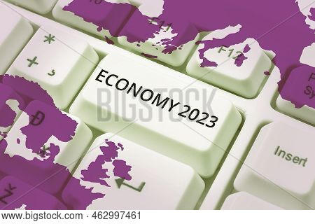 Hand Writing Sign Economy 2023. Business Concept State Of Wealth And Resources Of A Country In Upcom