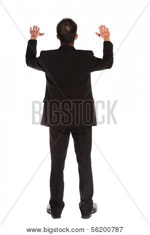 Back view of a businessman lifting his arms. Image with extra copy space. All isolated on white background.