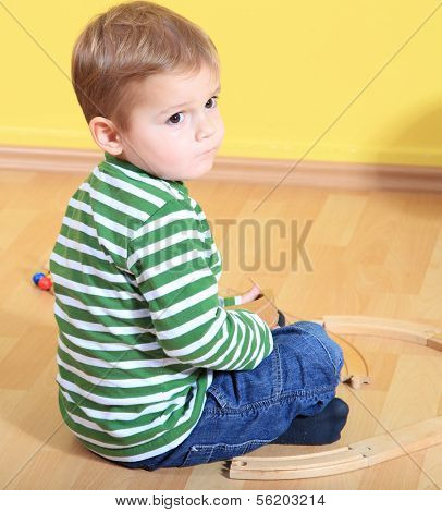 Cute caucasian toddler in kindergarten.
