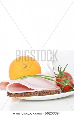 Fine served granary bread with boiled ham. All on white background.