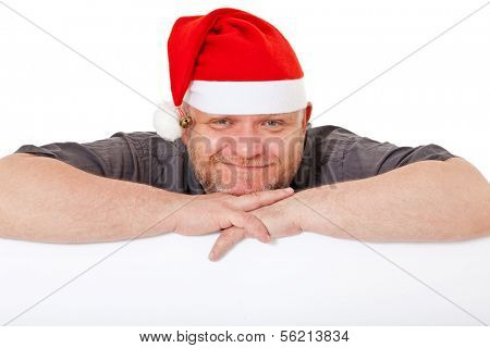 Charismatic middle aged man wearing christmas hat. All on white background.