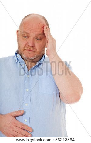 Charismatic middle aged man feels unwell. All on white background.