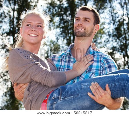 Young couple having fun outside.