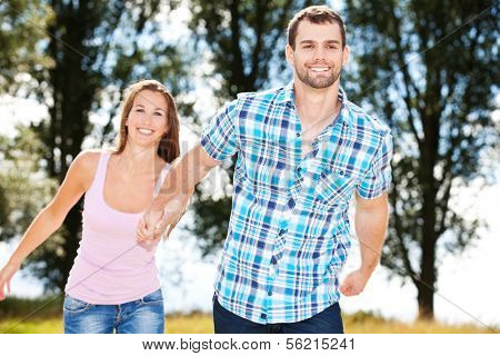 Young couple having fun outside.