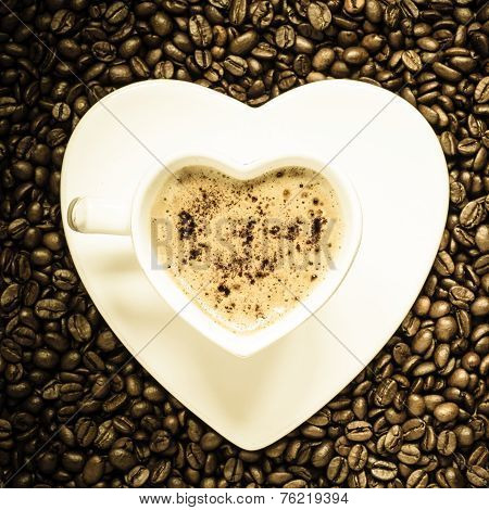 White Coffee Cup Heart Shaped With Cappucino