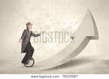 Happy business man riding a monocycle up on an arrow concept