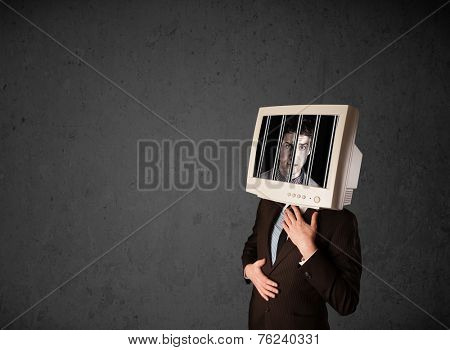 Business man with monitor screen on his head traped into a digital system concept