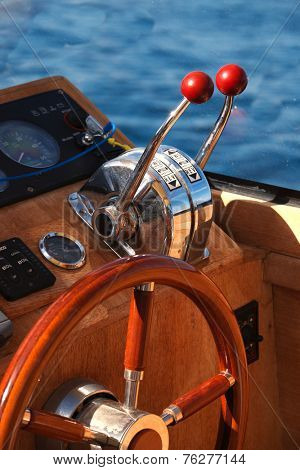 Steering wheel on luxury boat