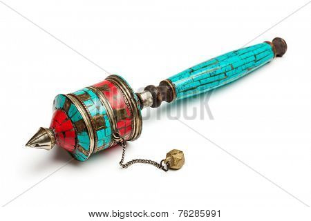 Tibetan buddhist Mani wheel or hand prayer wheel isolated on white