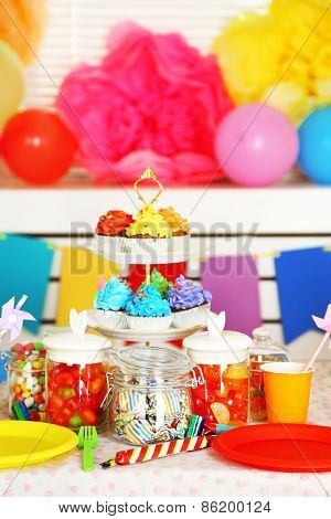 Prepared birthday table with sweets for children party