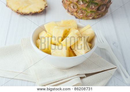 Pineapple Chunks In White Bowl