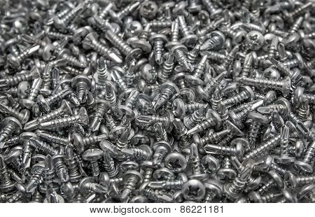 Background Pile Of Screws