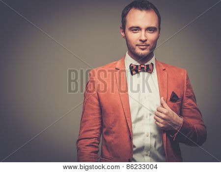 Sharp dressed fashionist wearing jacket and bow tie