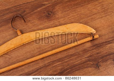 Antique Wooden Clothes Hanger On The Wood