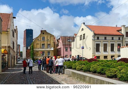 Tourists See Sights In Street Of Old Town In Klaipeda