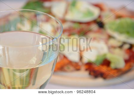 Glass Of Wine And Pizza