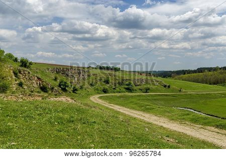General view toward sedimentary rock in the field