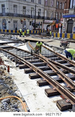Some Workers Repair And Replace Some Rail Trams